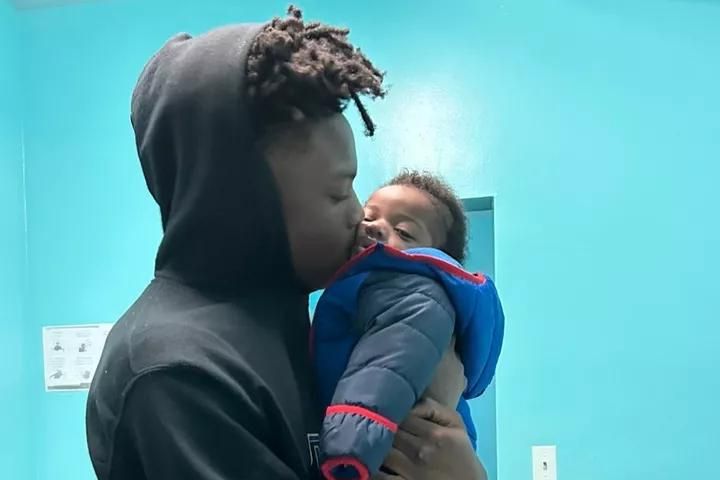 photo of Dalaneo Martin with baby