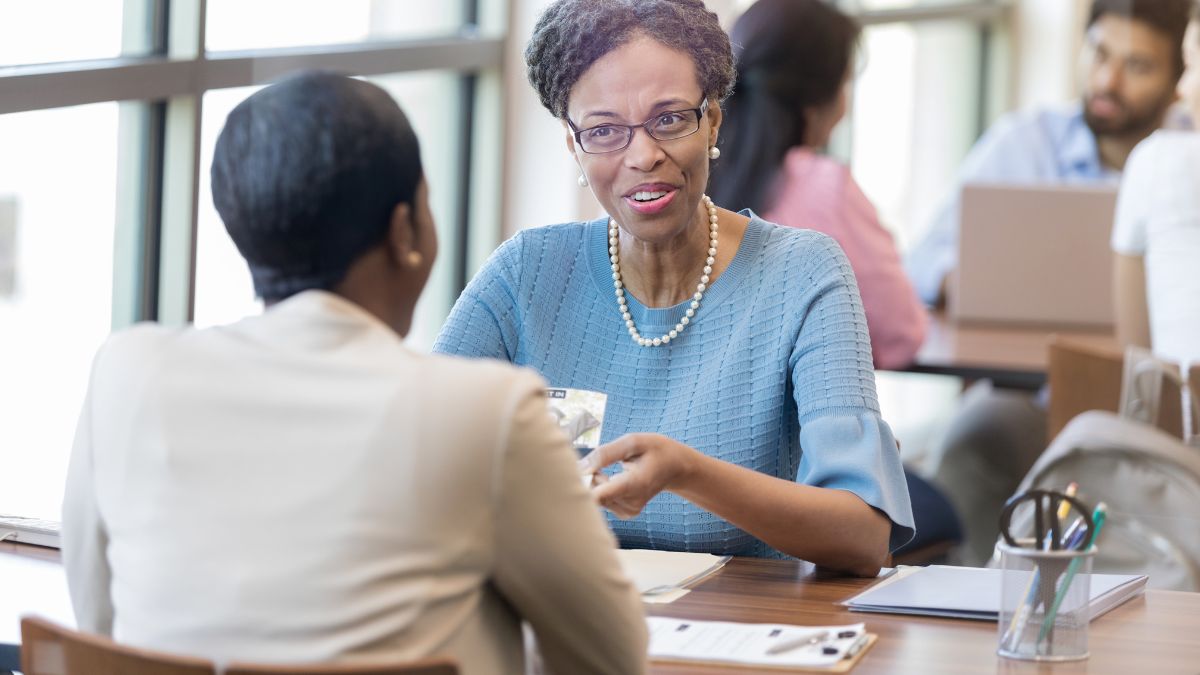 A financial planner consults with a client