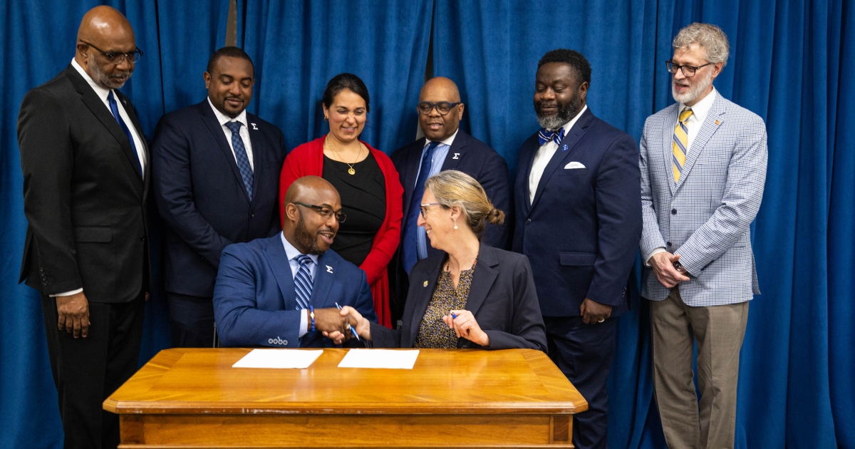 U.S. Fish and Wildlife Service and Phi Beta Sigma officials