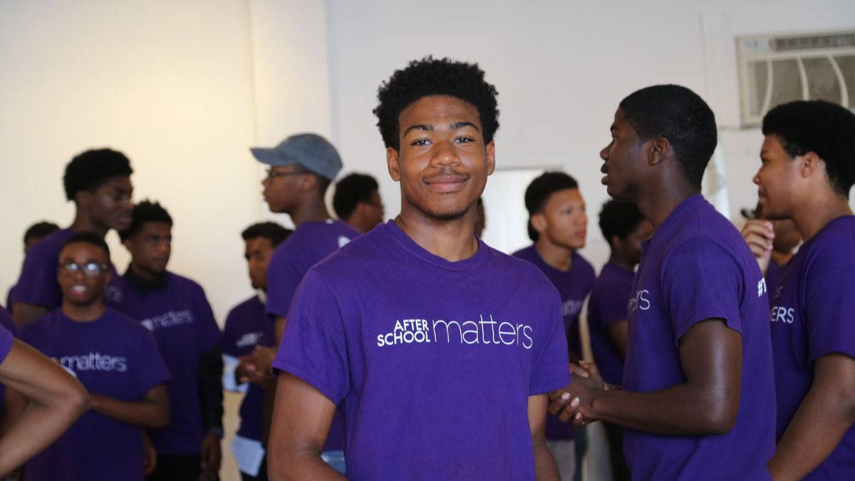 Teen in Purple Shirt