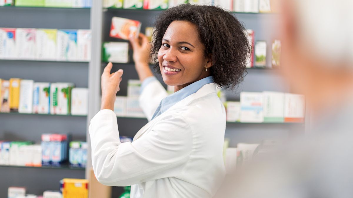Pharmacist serving OTC medication
