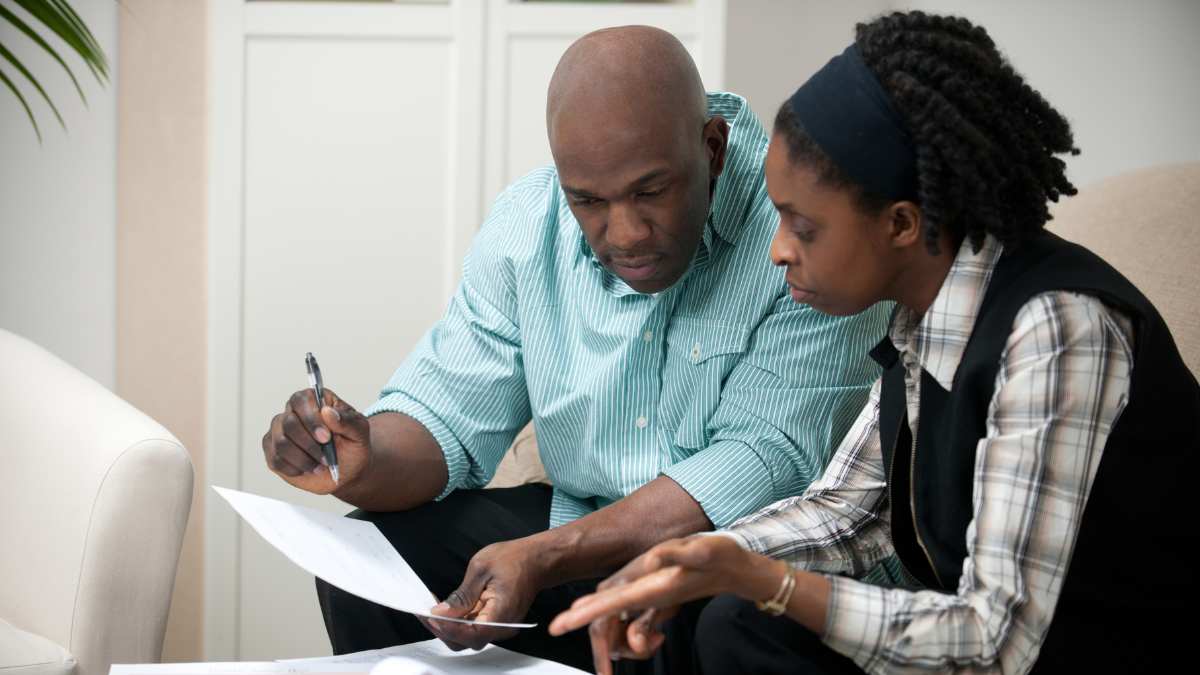 A couple engages in financial planning -- Money Smart Week