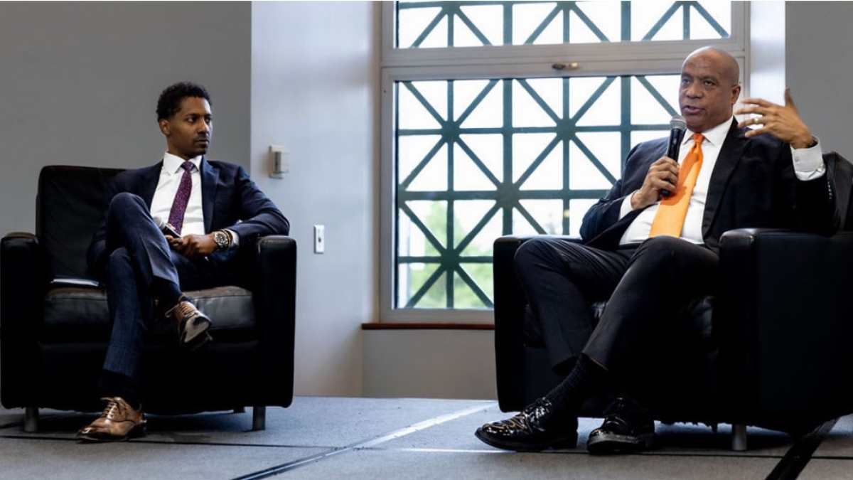 World Business Chicago Board Vice-Chair Charles Smith with in discussion with Chicago Bears Team President and CEO Kevin Warren