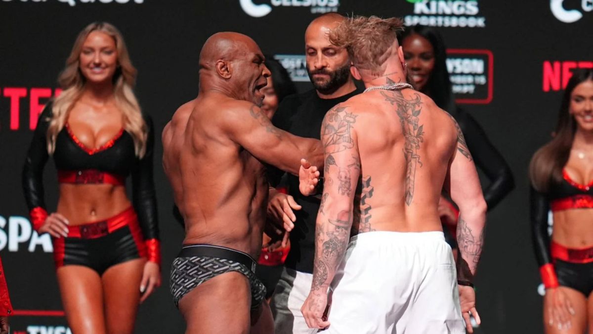 Mike Tyson hits Jake Paul during the formal weigh-in for Friday’s fight (AP via freemalaysiatoday.com under CC BY 4.0).